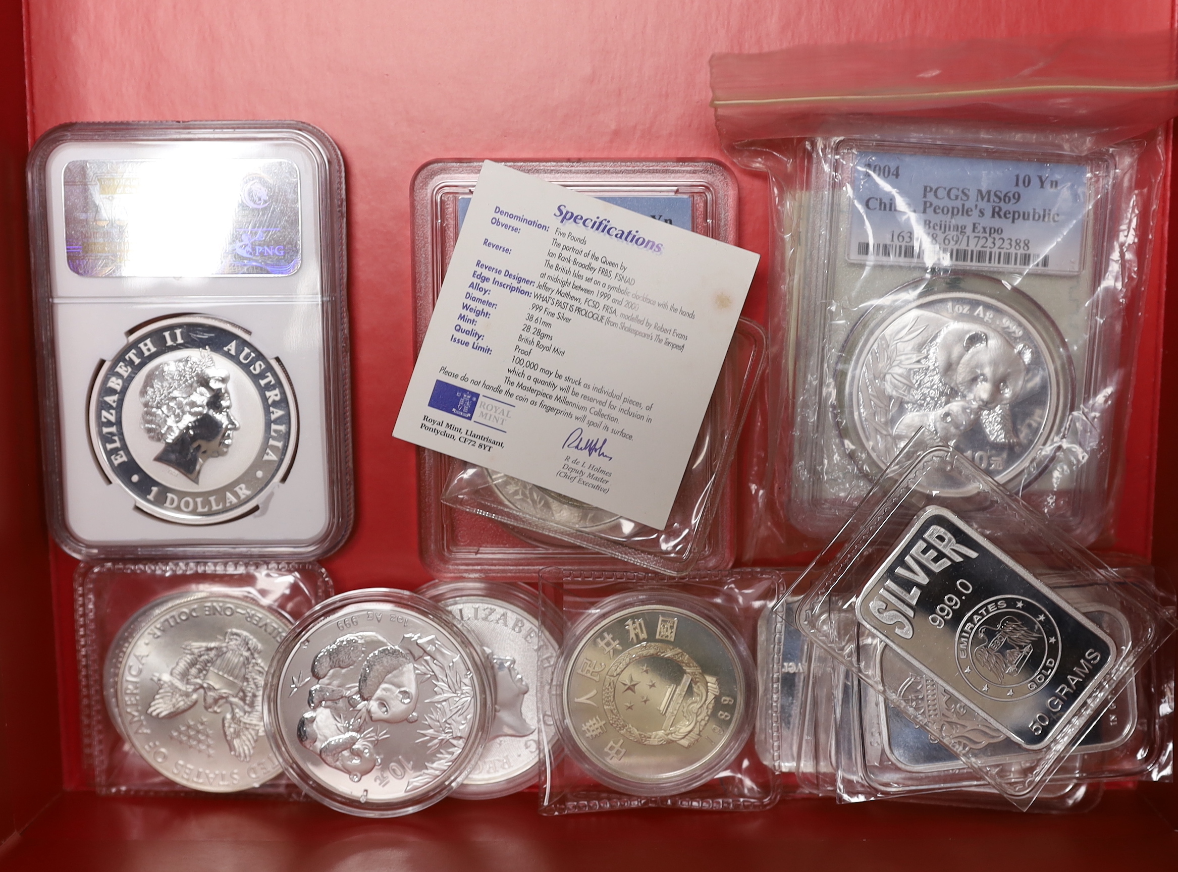 Nineteen silver commemorative coins, medals or silver ingots, including Australia $1 koala 2012p, NGC graded MS 69, People’s Republic China 10 yuan 1995, PCGS graded MS 68 and 10 yuan 2004, PCGS graded MS 69